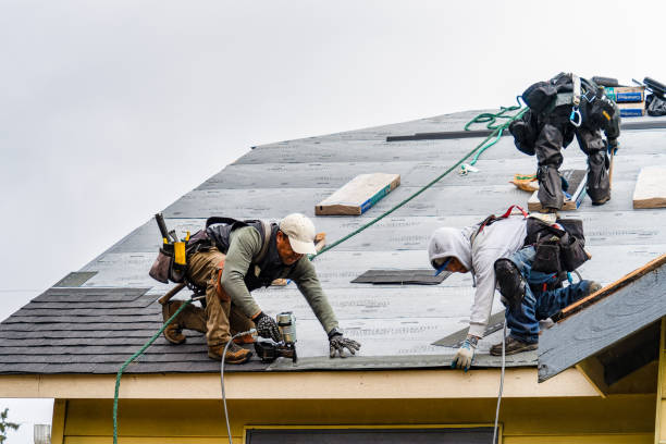 Professional Gutter Installation technician working in Crownsville, MD